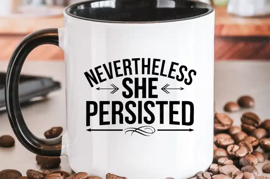 A White Mug With Black Text On It