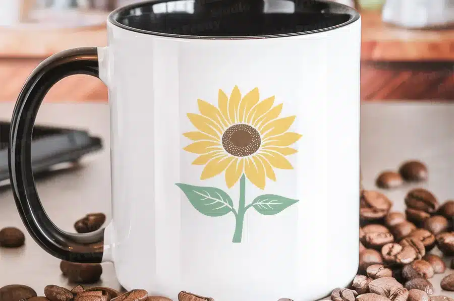 White Coffee Mug With Black Handle, Featuring A Yellow Sunflower Design.