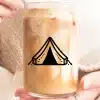Hands Holding A Mason Jar Of Iced Coffee With A Tent Graphic.