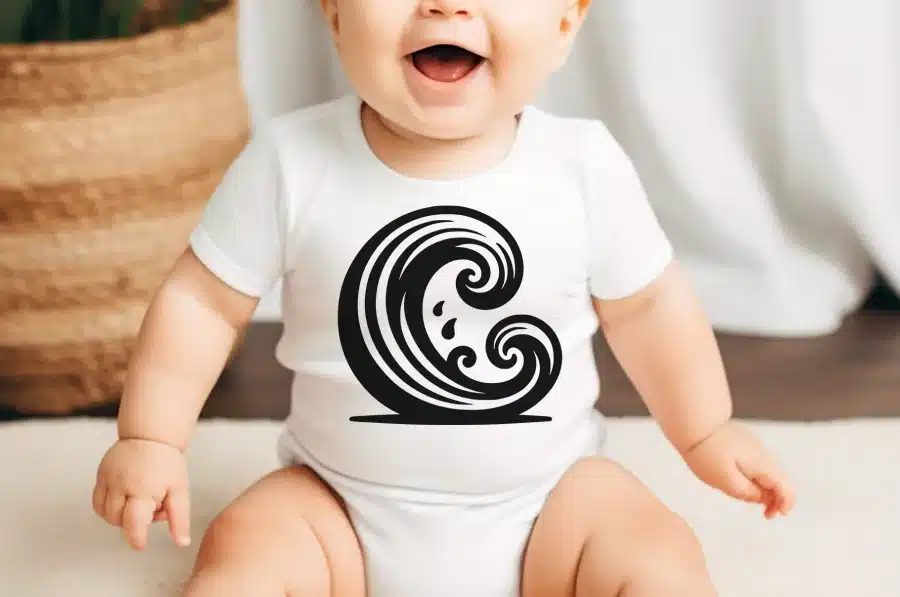 Baby Wearing A White Onesie With A Black Wave Design.
