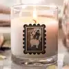 A Candle With A Picture Of A Dog On It