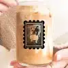 A Person Holding A Can Of Coffee