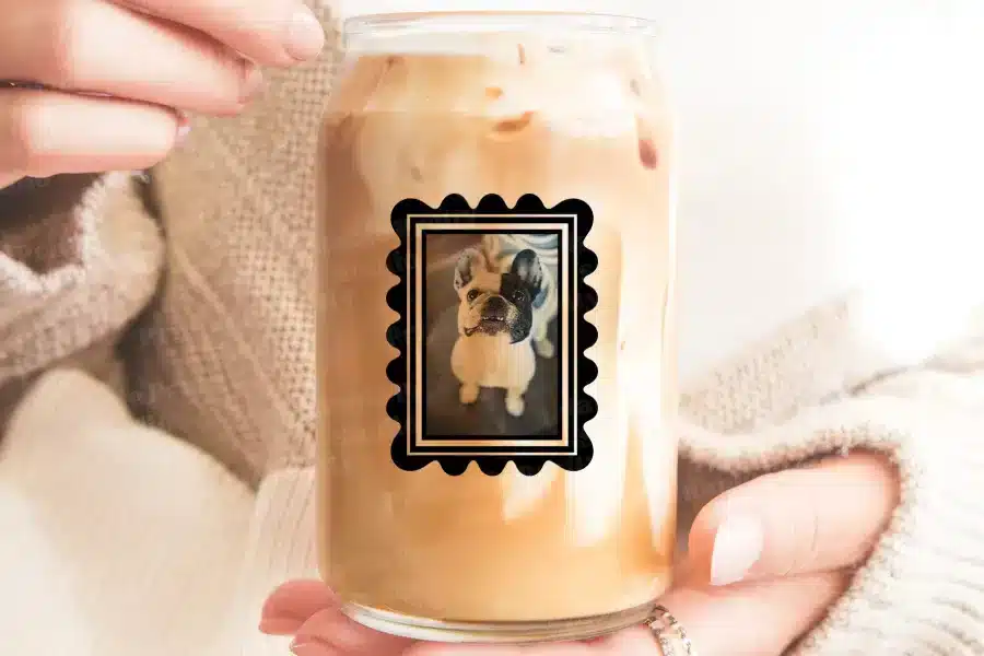 A Person Holding A Can Of Coffee