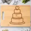 Bamboo Cutting Board With Engraved Three-Tiered Wedding Cake Design.
