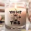 A Lit Candle In A Glass Jar With The Text You Got This And An Illustration Of A Cheerful Bunny Giving A Thumbs Up.